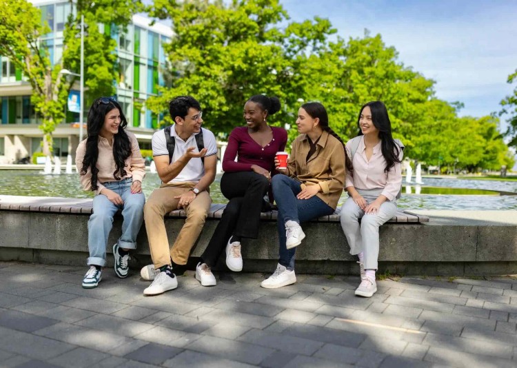 students by the fountain
